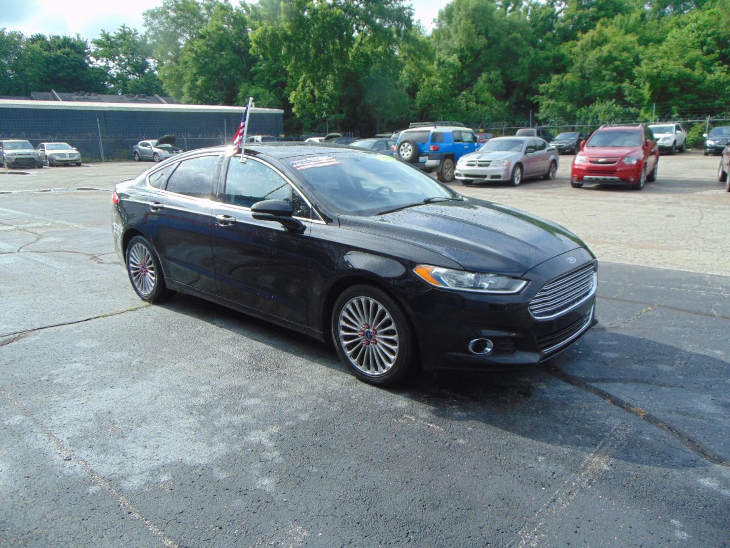 2016 Black Ford Fusion (3FA6P0K97GR) with an 4-Cyl EcoBoost 2.0T engine, Auto, 6-Spd SelectShift transmission, located at 2105 Dixie Hwy, Louisville, KY, 40210, (502) 772-3333, 38.220932, -85.795441 - Photo#3